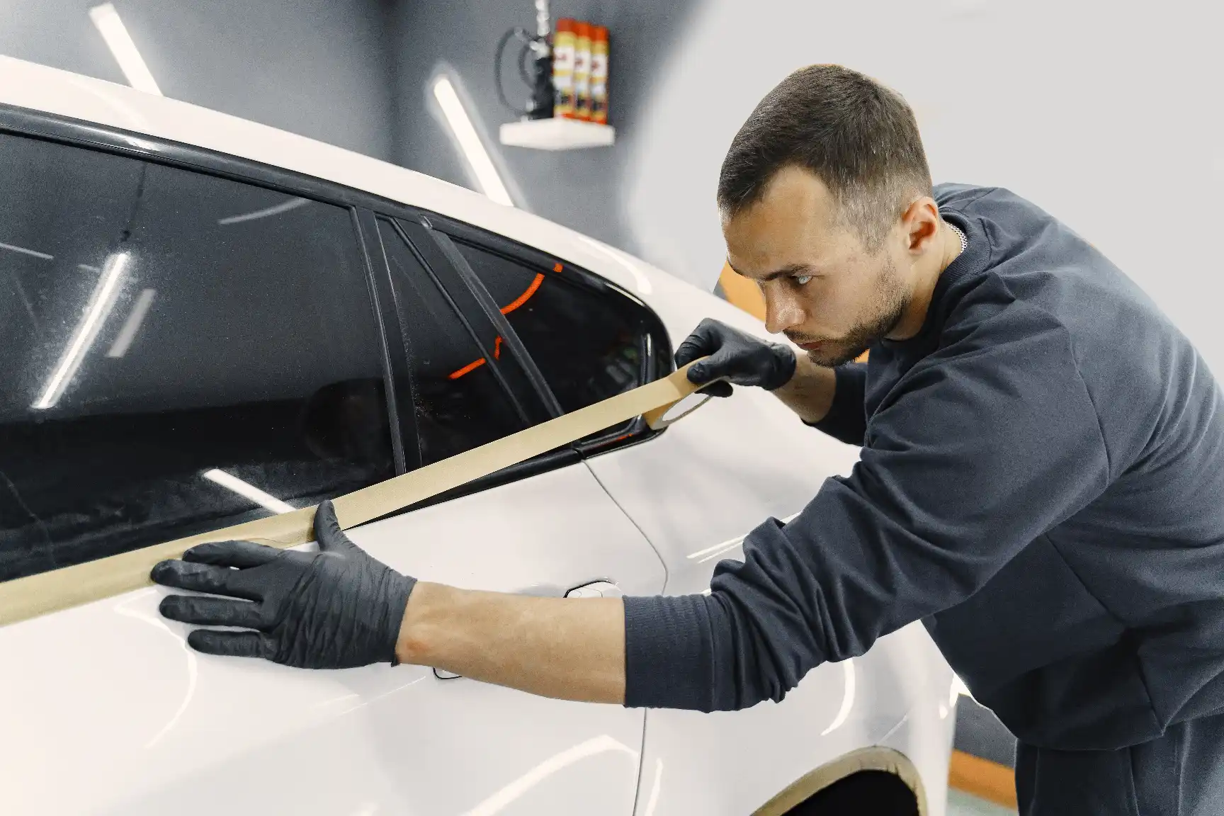 Tint Bros Adelaide paint protection film 2026 price guide showing coverage zone options from bonnet only to full vehicle with starting prices